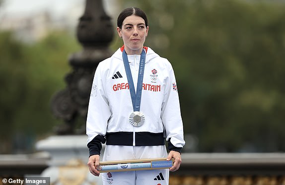 PARIS, FRANCE - JULY 27: Silver medalist Anna Henderson of Team Great Britain poses on the podium during the Women's Individual Time Trial at the 2024 Olympic Games, at Pont Alexandre III on July 27, 2024 in Paris, France. (Photo by Tim de Waele/Getty Images)