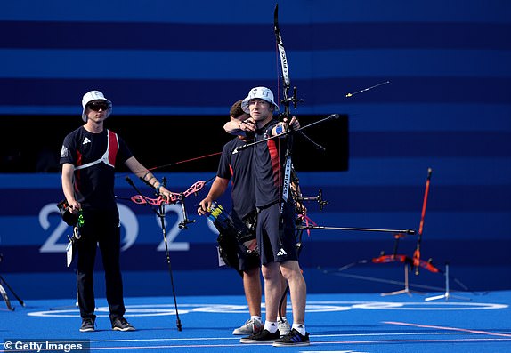 PARIS, FRANCE - JULY 29: Conor Hall of Team Great Britain takes a shot during the Men's Team 1/8 Elimination match between Team Chinese Taipei and Team Great Britain on day three of the Olympic Games Paris 2024 at Esplanade Des Invalides on July 29, 2024 in Paris, France. (Photo by Julian Finney/Getty Images)