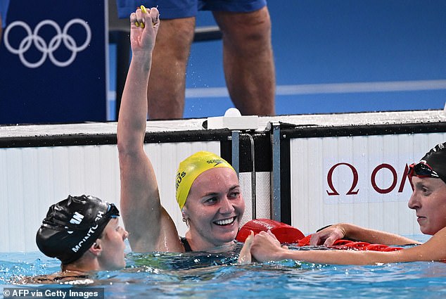 Ariarne Titmus defending her Olympic title, leaving Ledecky struggling in third place, with Canada's Summer McIntosh pushing her in the race