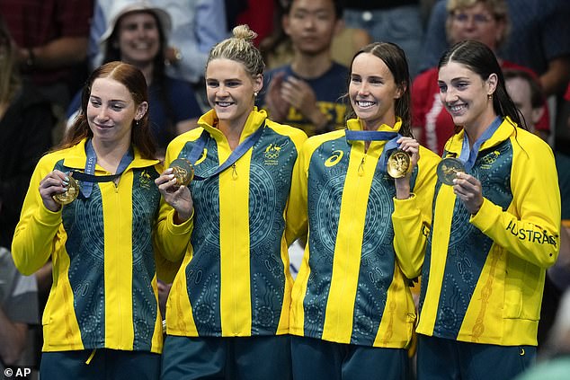 McKeon added yet another Olympic gold medal to her trophy cabinet with victory in the women's 4x100m freestyle final on Sunday morning (pictured second from right)