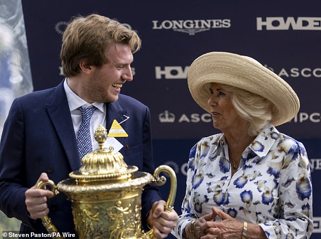 Queen Camilla (right) presented the King George VI and Queen Elizabeth Qipco Stakes trophy