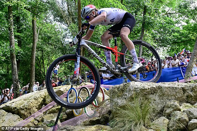 Batten competes in the women's cross-country mountain biking event in France.