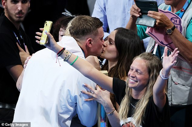 Peaty and Ramsay shared a kiss after his silver medal as she showed her support for him