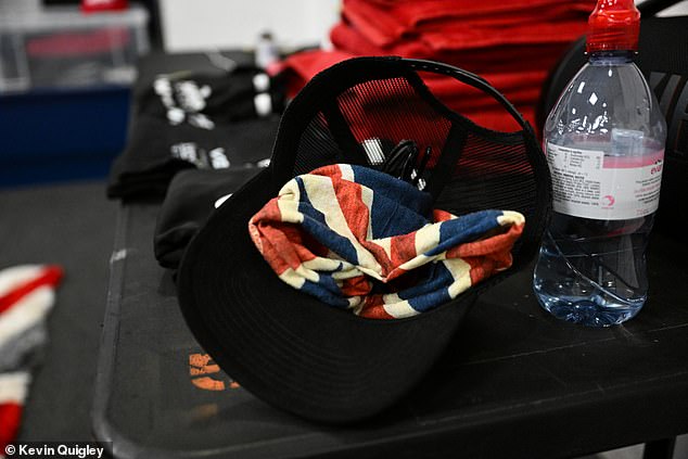 Chisora's hat and face mask lie on the table, familiar items for fans