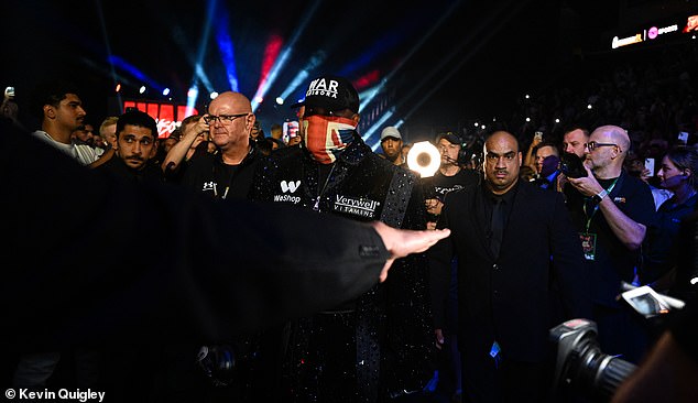 Chisora's ring walk concludes just before the intense battle in London