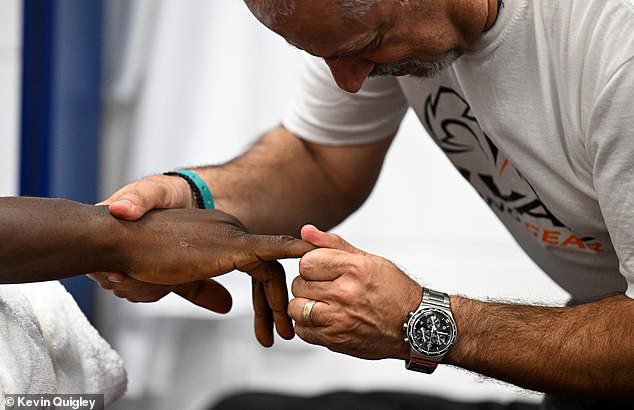 Chisora's fingers checked ahead of being tightly wrapped