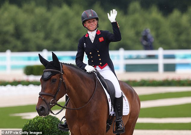 Canter waves to the crowd on Lordships Graffalo after competing in the dressage on Saturday