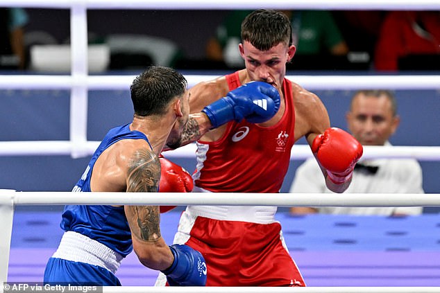 Garside, 27, cut a dejected figure after the bout, looking emotional as Kovacs celebrated his victory