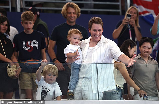 Daley was cheered on in the crowd by his husband Dustin Lance Black and their two children, Robbie, 6, and Phoenix, one