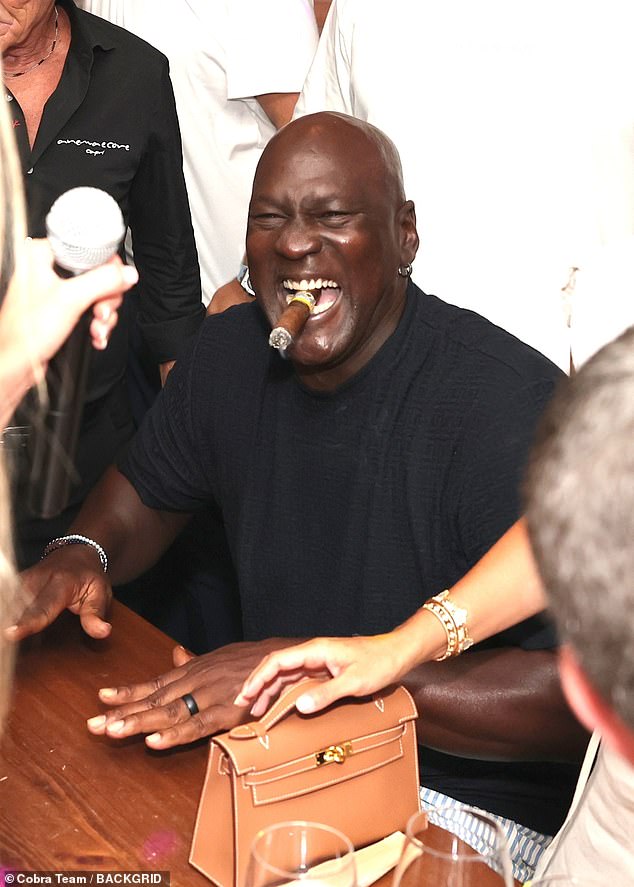 Jordan laughed while he was seen with his signature cigar in his mouth in Italy