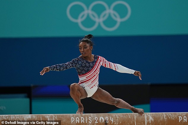 SImone Biles of USA competes during the Women's Artistic Gymnastics Women's Team Final