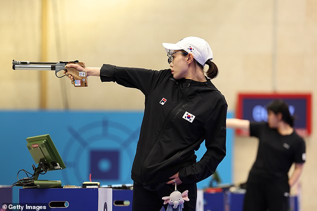 Kim participating in the women's 10m air pistol event