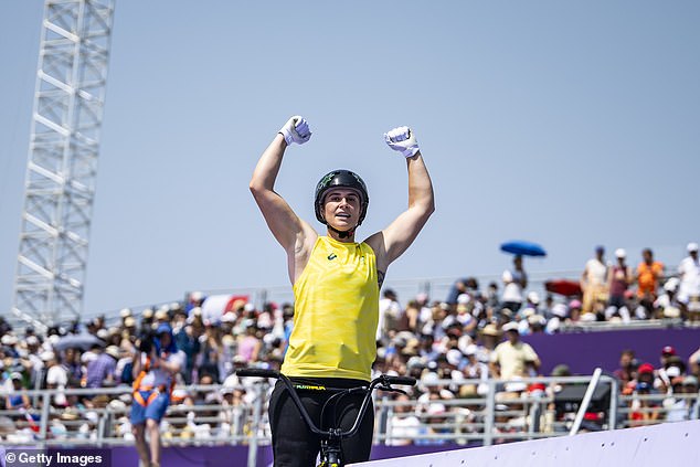 Natalya Diehm celebrates after scoring a spot on the medal podium