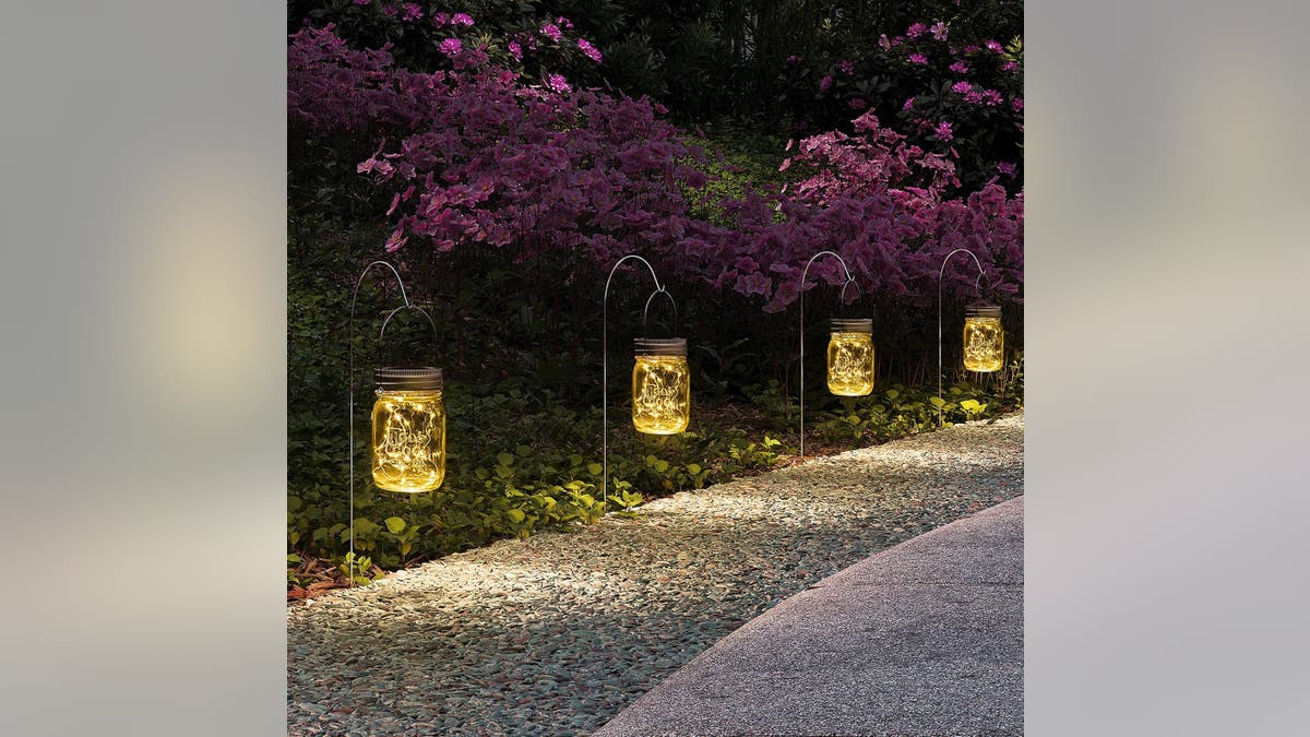 Mason jar lanterns add a rustic touch to your outdoor space.