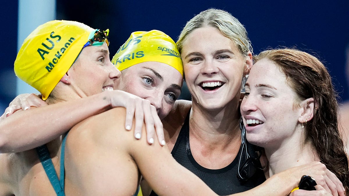 Australian swimmers celebrating in joy