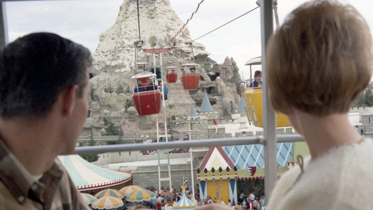 A couple ascending the gondola towards the Matterhorn.