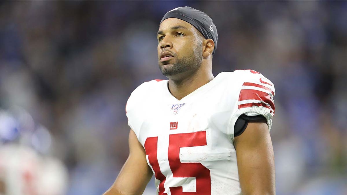 Golden Tate on the football turf during an NFL game