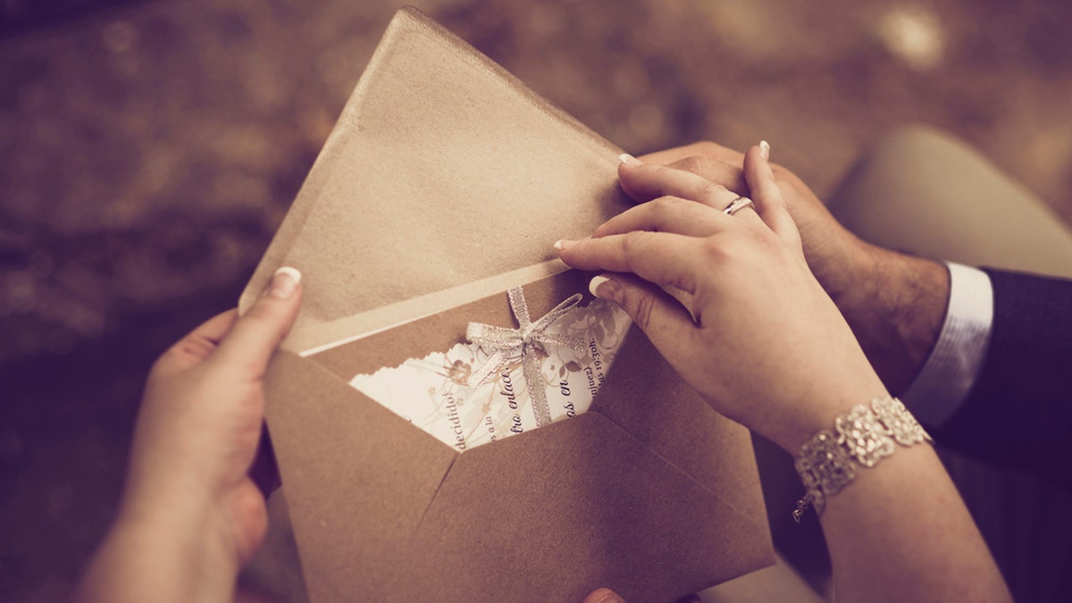 Guests reading an invitation