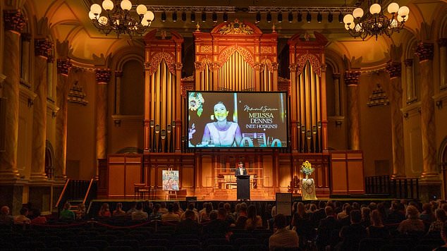 Friends and family attend the memorial service for Melissa at Adelaide Town Hall. Picture: ABC / Brant Cumming