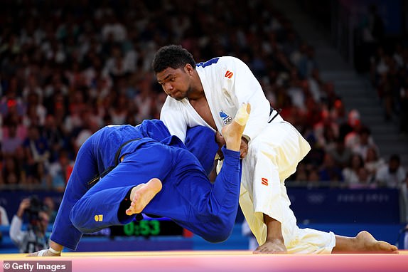 PARIS, FRANCE - AUGUST 02: Gerard Takayawa of Team Fiji and Marius Fizel of Team Slovakia compete during the Men's +100kg Elimination Round of 32 match between Gerard Takayawa of Team Fiji and Marius Fizel of Team Slovakia on day seven of the Olympic Games Paris 2024 at Champs-de-Mars Arena on August 02, 2024 in Paris, France. (Photo by Luke Hales/Getty Images)