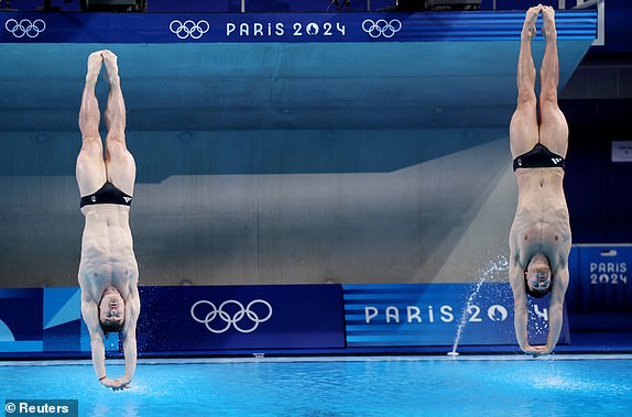 Paris 2024 Olympics - Diving - Men's Synchronised 3m Springboard Final - Aquatics Centre, Saint-Denis, France - August 02, 2024. Anthony Harding of Britain and Jack Laugher of Britain in action. REUTERS/Leah Millis