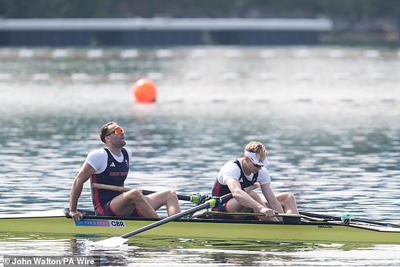 Great Britain's Ollie Wynne-Griffith and Tom George react after winning silver in the Rowing Men's Pair finals at the Vaires-sur-Marne Nautical Stadium on the seventh day of the 2024 Paris Olympic Games in France. Picture date: Friday August 2, 2024. PA Photo. Photo credit should read: John Walton/PA Wire. RESTRICTIONS: Use subject to restrictions. Editorial use only, no commercial use without prior consent from rights holder.