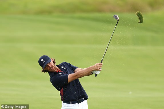 PARIS, FRANCE - AUGUST 03: Tommy Fleetwood of Team Great Britain plays a shot on the sixth hole during Day Three of the Men's Individual Stroke Play on day eight of the Olympic Games Paris 2024 at Le Golf National on August 03, 2024 in Paris, France. (Photo by Kevin C. Cox/Getty Images)