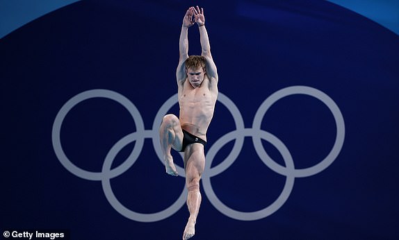 PARIS, FRANCE - AUGUST 06: Jack Laugher of Team Great Britain competes in the Men's 3m Springboard Preliminary on day eleven of the Olympic Games Paris 2024 at Aquatics Centre on August 06, 2024 in Paris, France. (Photo by Clive Rose/Getty Images)