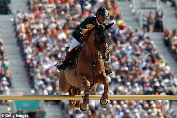 VERSAILLES, FRANCE - AUGUST 06: Ramzy Al Duhami and horse Untouchable 32 of Team Saudi Arabia compete in the Jumping Individual Final on day eleven of the Olympic Games Paris 2024 at Chateau de Versailles on August 06, 2024 in Versailles, France. (Photo by Alex Broadway/Getty Images)