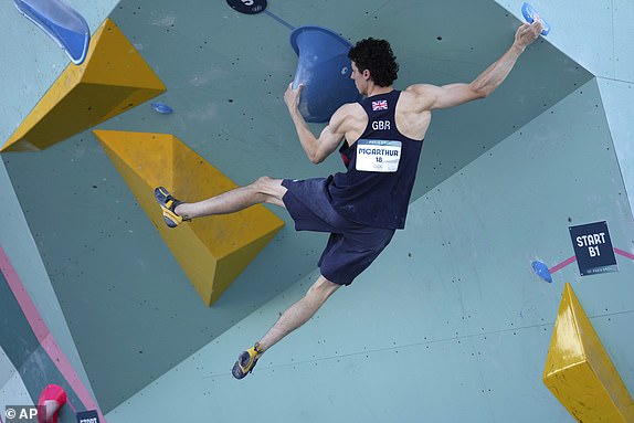 Hamish McArthur of Britain competes in the men's boulder and lead sport climbing at the 2024 Summer Olympics, Le Bourget, France. (AP Photo/Tsvangirayi Mukwazhi)