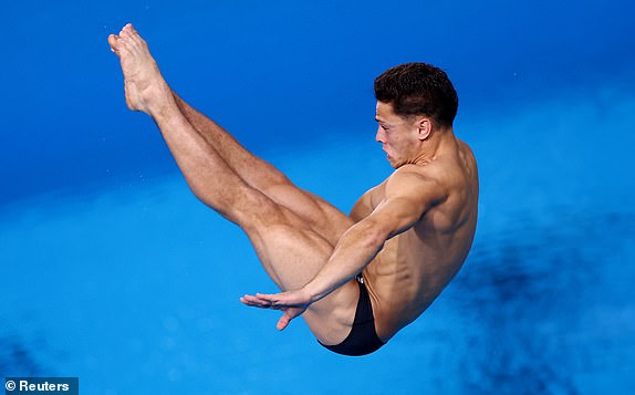 Paris 2024 Olympics - Diving - Men's 3m Springboard Semifinal - Aquatics Centre, Saint-Denis, France - August 07, 2024. Jordan Christopher Houlden of Britain in action. REUTERS/Hannah Mckay