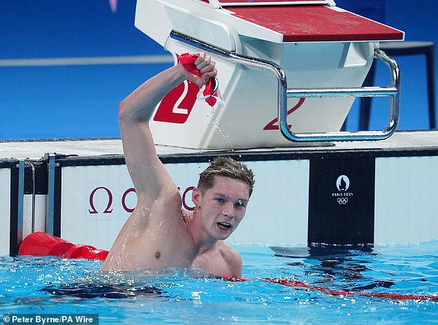 Team GB 's Duncan Scott added another Olympic medal to his stunning collection after winning silver in the men's 200m medley final