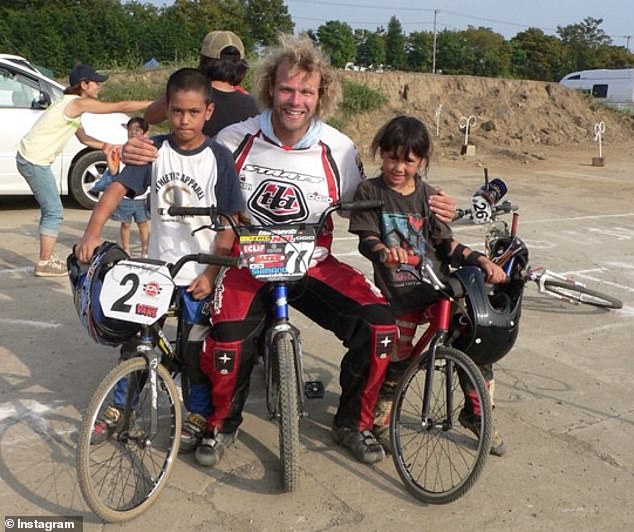 Kai and Saya Sakakibara as children with Dutch motocross legend Robert de Wilde