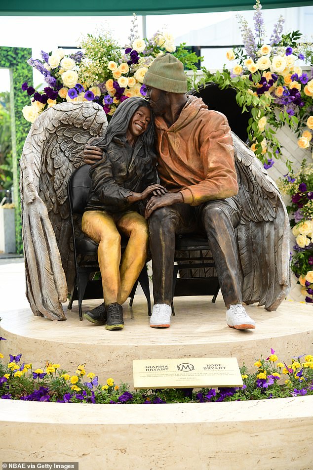 The bronze statue is titled 'Girl Dad' and shows Kobe wearing a WNBA hoodie