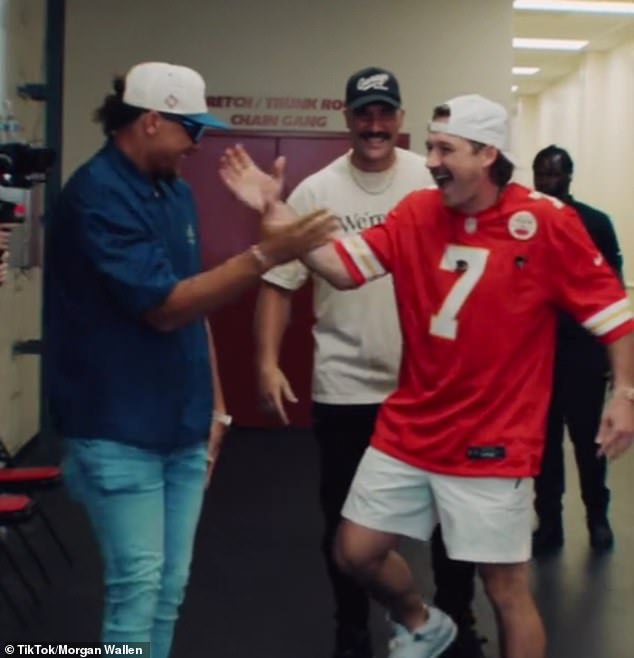 Travis Kelce and Patrick Mahomes with Morgan Wallen at his Kansas City concert