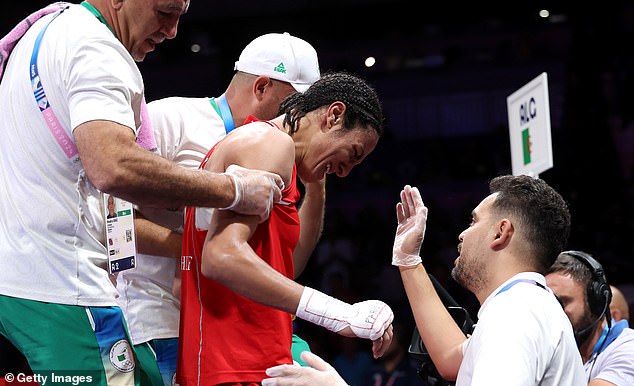 Khelif sobbed with her team following her 66kg category quarter-final victory on Saturday