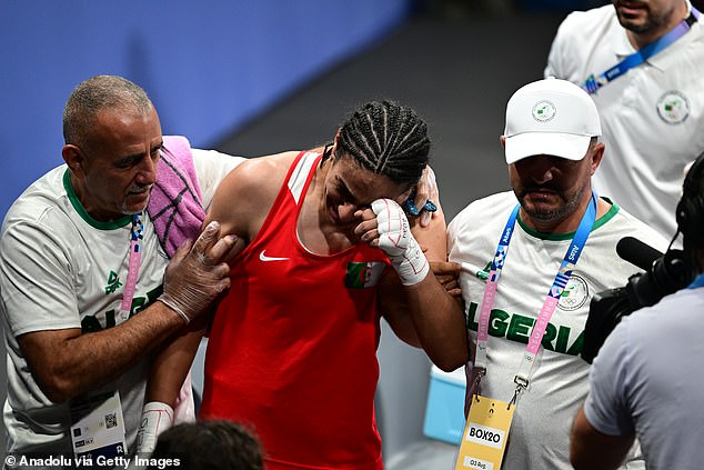 An emotional Khelif guaranteed she will win at least a bronze medal after her victory