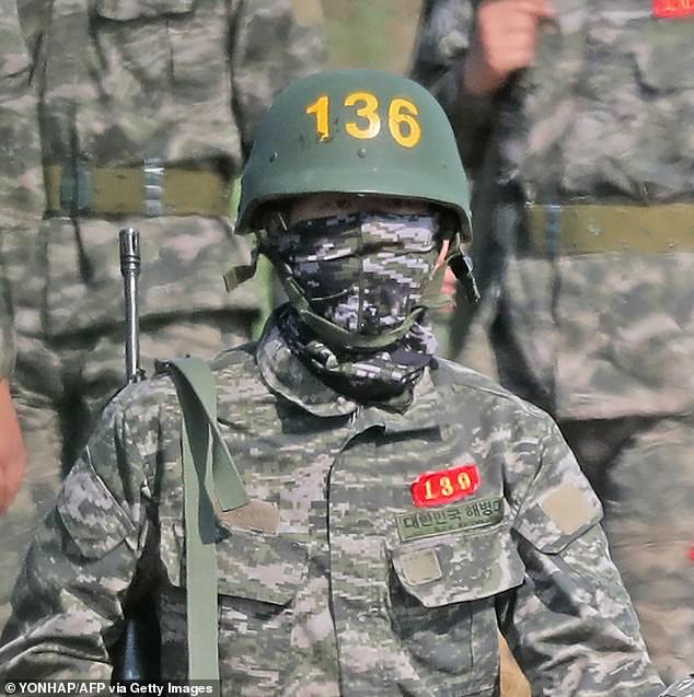 Son pictured in military uniform during his basic training on Jeju island back in May 2020