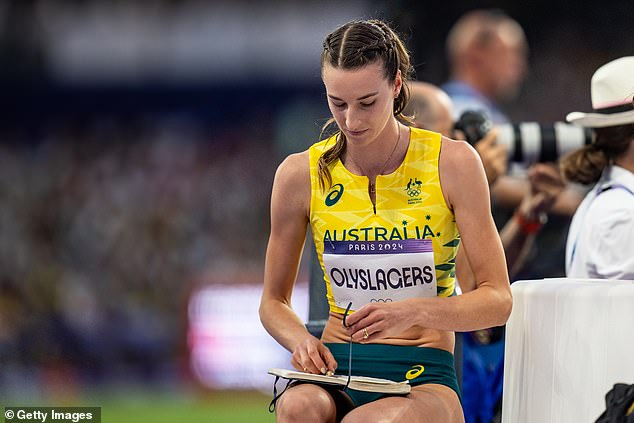 Australian competitor Nicola Olyslagers intensely took notes on her performance between jumps