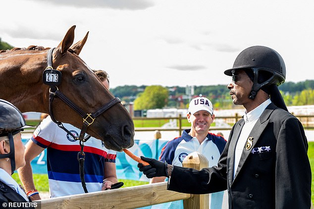 The rapper even fed some horses despite his previously disclosed fear of riding them