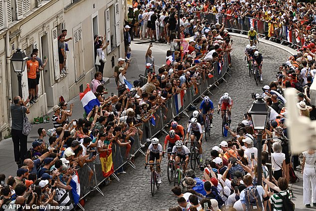 Buses were stopped due to a road block for the cycling event