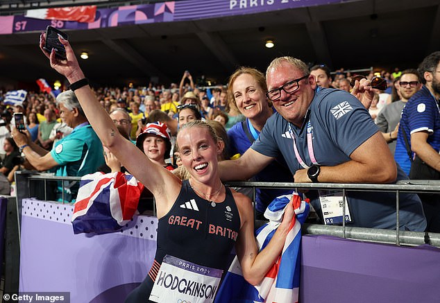 Gold medalist Keely Hodgkinson of Team Great Britain takes a selfie during the Women's 800m Final on day ten of the Olympic Games Paris 2024 at Stade de France on August 05, 2024 in Paris, France