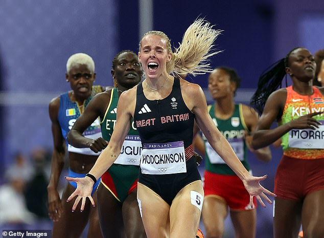 Keely reacts seconds after crossing the finish line at the Stade de France on Monday night in first place