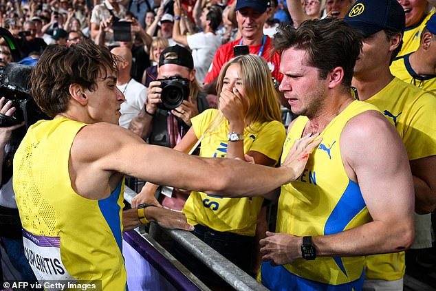 The pole vault champion then celebrated wildly with one of his Sweden teammates in Paris