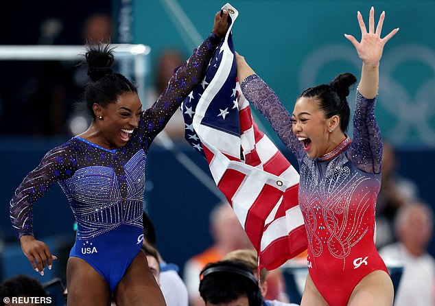 Lee and her USA teammate Simone Biles (L) won gold in the team all-around event on July 30