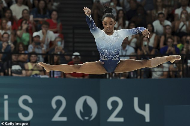 Biles competes during the Artistic Gymnastics Women's Balance Beam Final on day ten