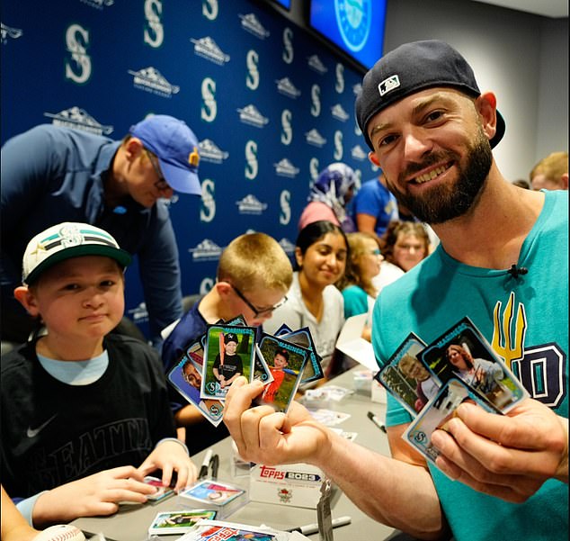 It was the turn of Seattle Mariners players to be autograph hunters at T-Mobile Park on Tuesday