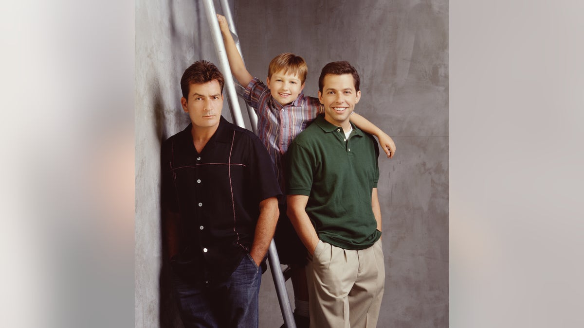 Charlie Sheen, Jon Cryer, and Angus T. Jones seen in a 'Two and a Half Men' promo shot