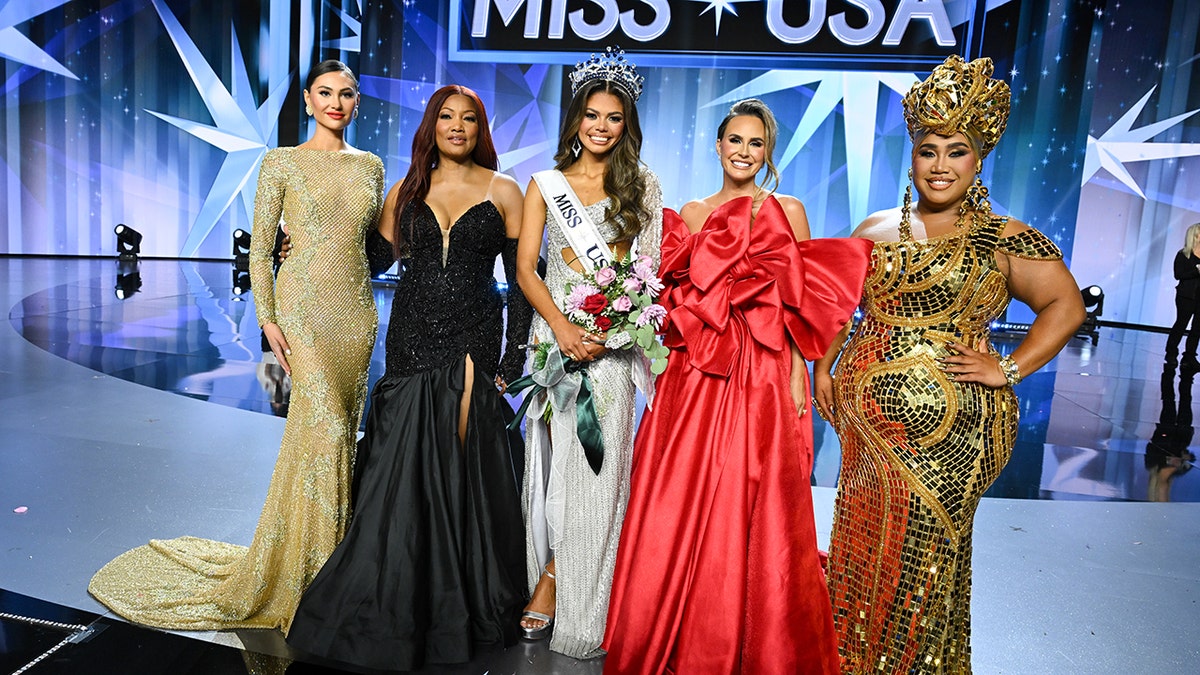 Morgan Romano, Garcelle Beauvais, Alma Cooper, Miss Michigan USA-winner of Miss USA 2024, Keltie Knight, and Patrick Starrr at the 73rd annual Miss USA Pageant at Peacock Theater on August 4, 2024, in Los Angeles, California.