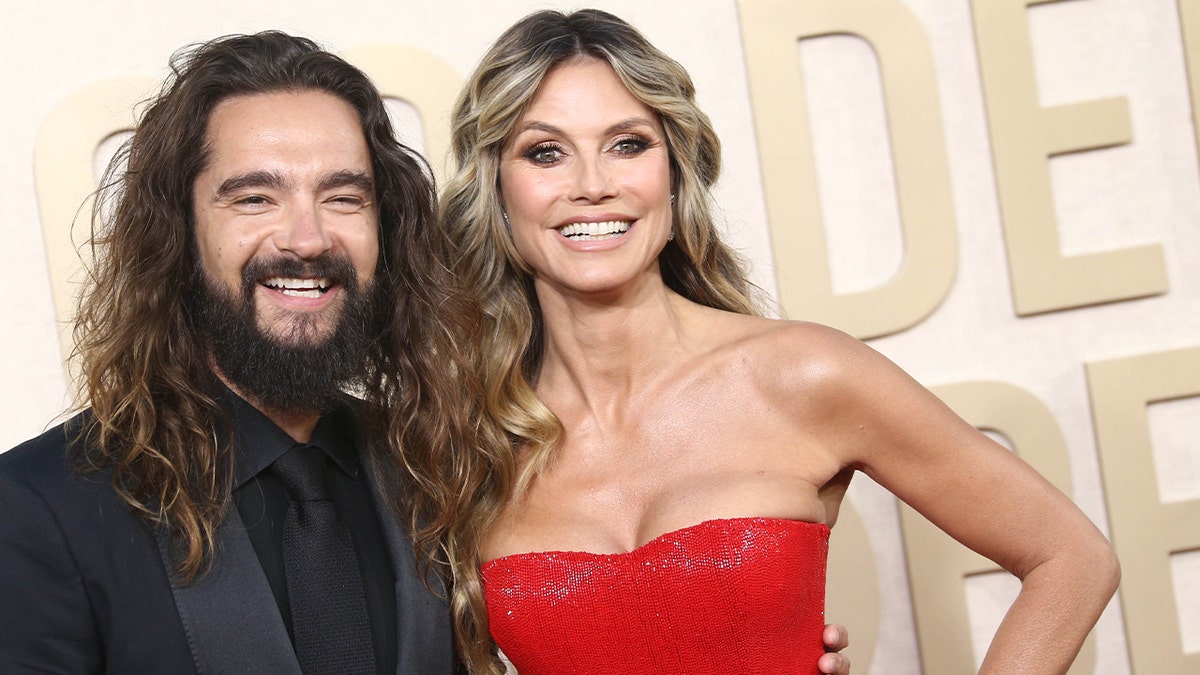 Heidi Klum and Tom Kaulitz at an awards show.